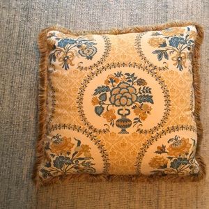 Gold and blue flower motif pillow